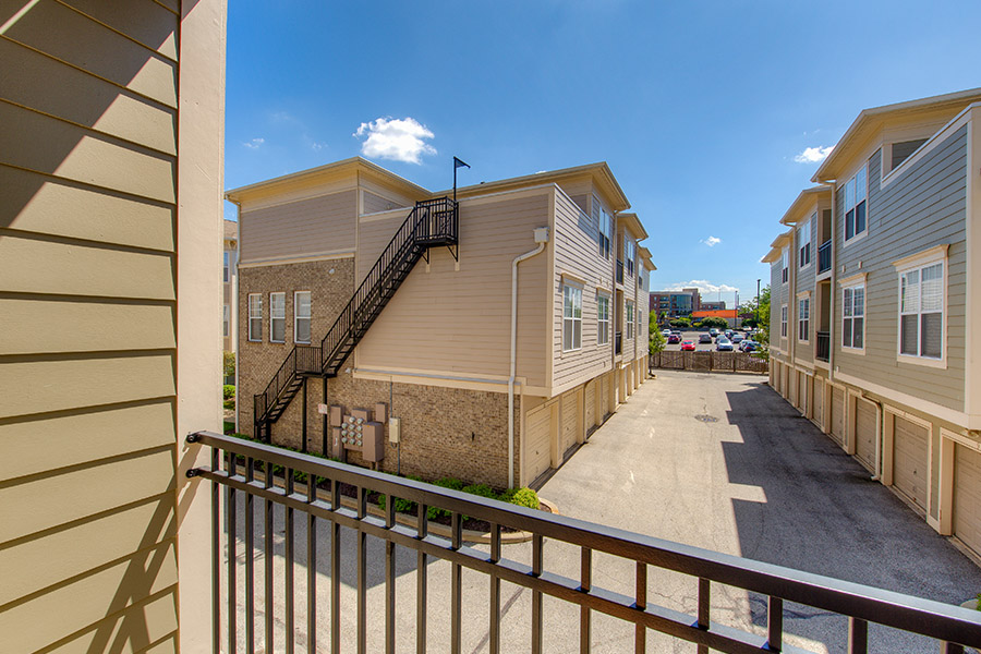 Balcony with a railing at Waverly Apartments