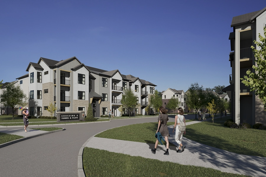 Not all Fishers apartment communities offer coach homes like Crossing 5 does. Two women walking through an apartment community